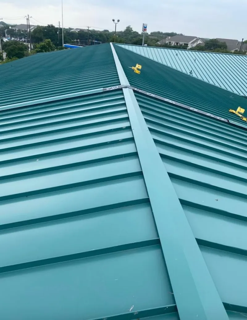 Green commercial metal roof ridge and valley for Metal Roof Repair in Topsfield