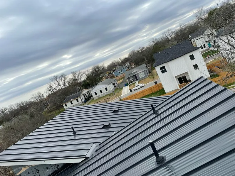 Standing seam metal roof panels with vents for Skylight Repair in Topsfield